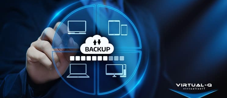 FutureTranz_LinkedIn_April1 man in suit holds up stylus behind circular graphic of hardware devices and word "backup"