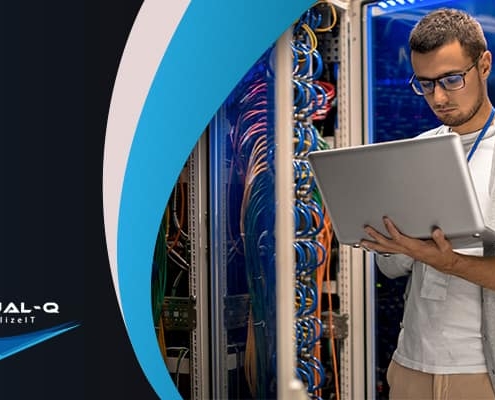 man holding laptop in data center next to multicolor background and FutureTranz logo